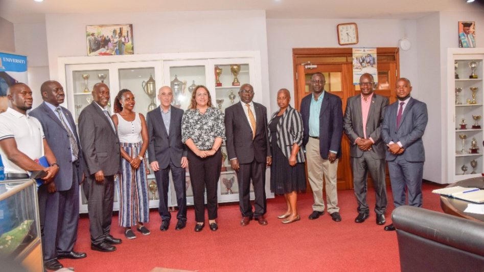 H.E. Michael Lotem (c) pose with Kyambogo University team led by the Vice chancellor Prof Eli Katunguka 3rd left