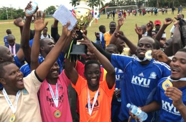 Kyu Non-Teaching staff celebrate after defeating Teaching staff 4-0
