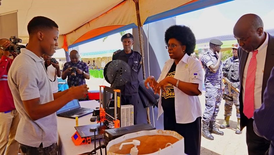 Minister for Science Technology and Innovations Dr. Monica Musenero and the Vice Chancellor Prof. Eli Katunguka inspecting innovations at the exhibition stalls during the second edition of STEAM Festival.