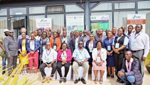 Participants pose for a group photo after Day one of the ToT workshop