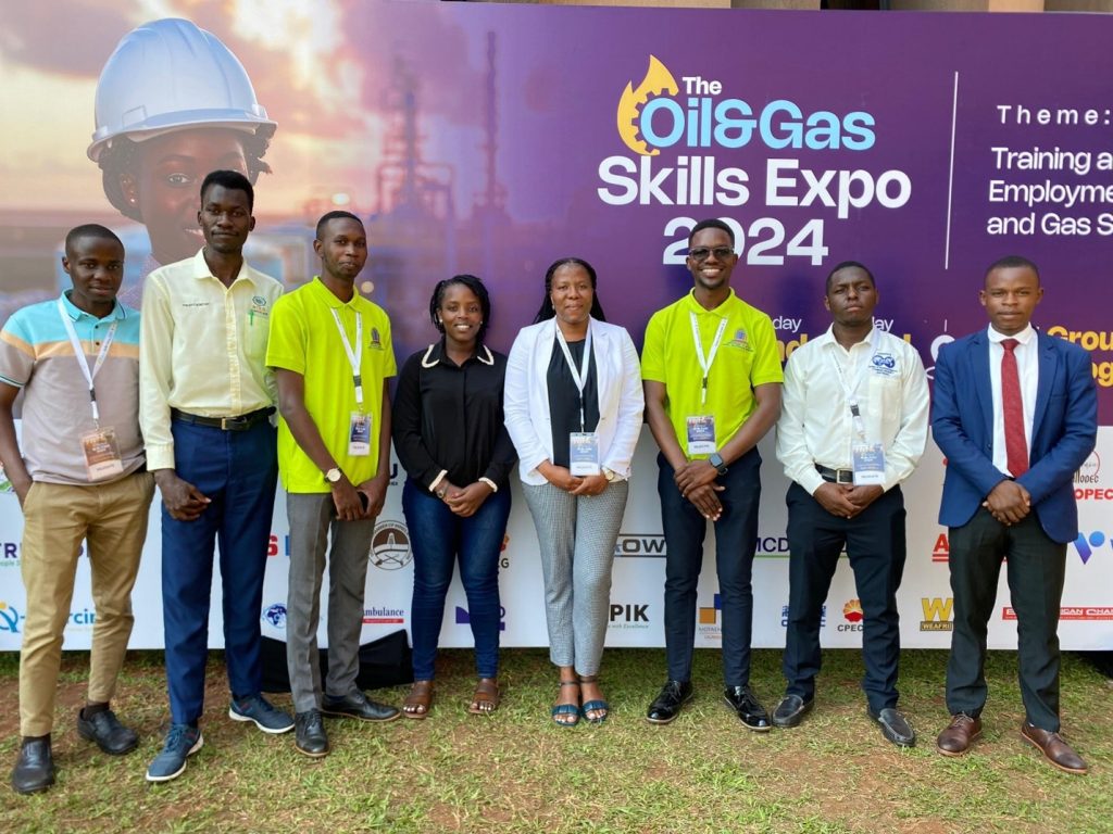 Timothy together with his mentor- Eng. Mercy Kitimbo Asiku (white coat) and other Chemical Engineering and Oil & Gas students participated in the 2024 Oil & Gas skills Expo hosted by Kyambogo University