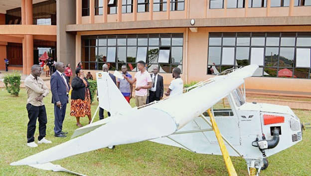 The-Chief-Guest-with-the-DVC-FA-Director-Graduate-Training-and-Dean-Faculty-of-Science-inspecting-an-innovation-of-aircraft