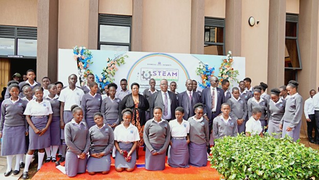 The Students of Nabisunsa Girls pose for a group photo with the Chief Guest.