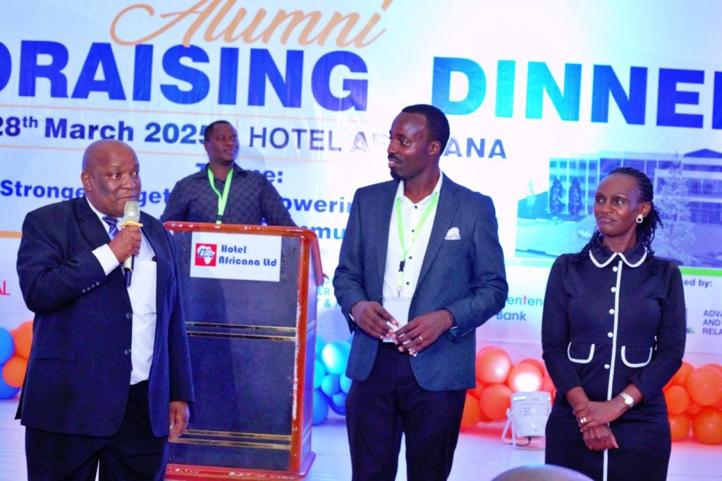 Eng. Aryeija Ambrose, the Chairperson Project Committee on the left, Eng. Gumiziriza Ezra, the Vice Chairperson in the middle and Dr. the head Advancement and Alumni Relations Unit on the right giving the timeline of the project during the alumni fundraising dinner at Hotel Africana.