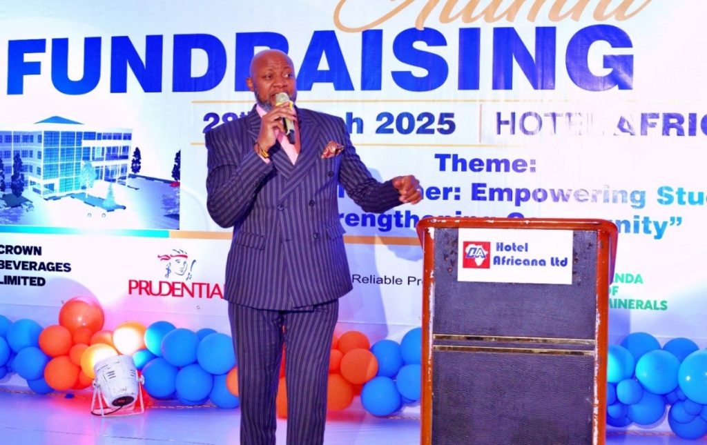 Mr. Kasumba Samson is entertaining the participants during the alumni fundraising dinner at Hotel Africana.