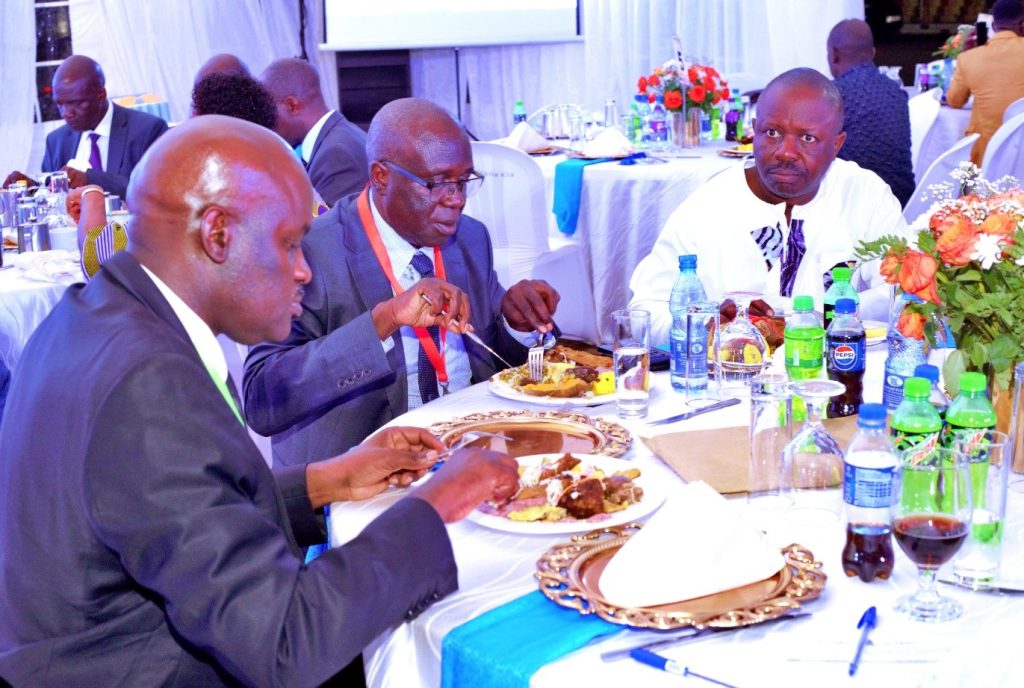 Participants enjoying the delicious meal served at Hotel Africana during the alumni fundraising dinner