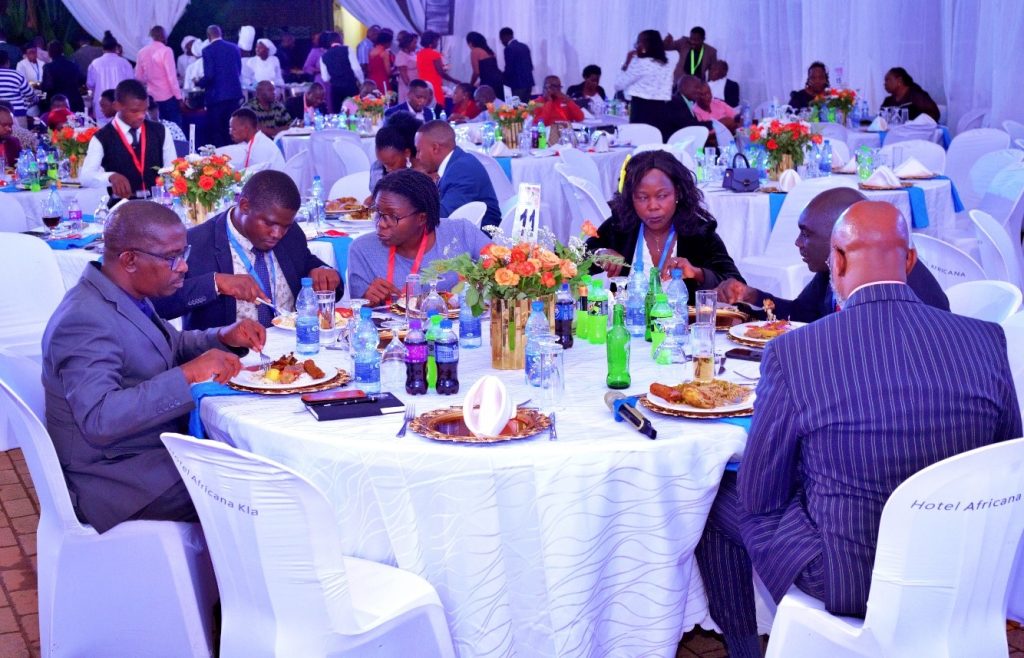 Participants enjoying the delicious meal served at Hotel Africana during the alumni fundraising dinner