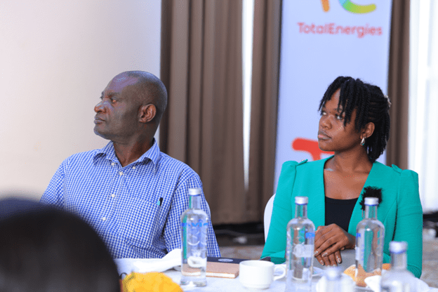 Eng. Mukasa Naleeta (Estates Dept) and a student