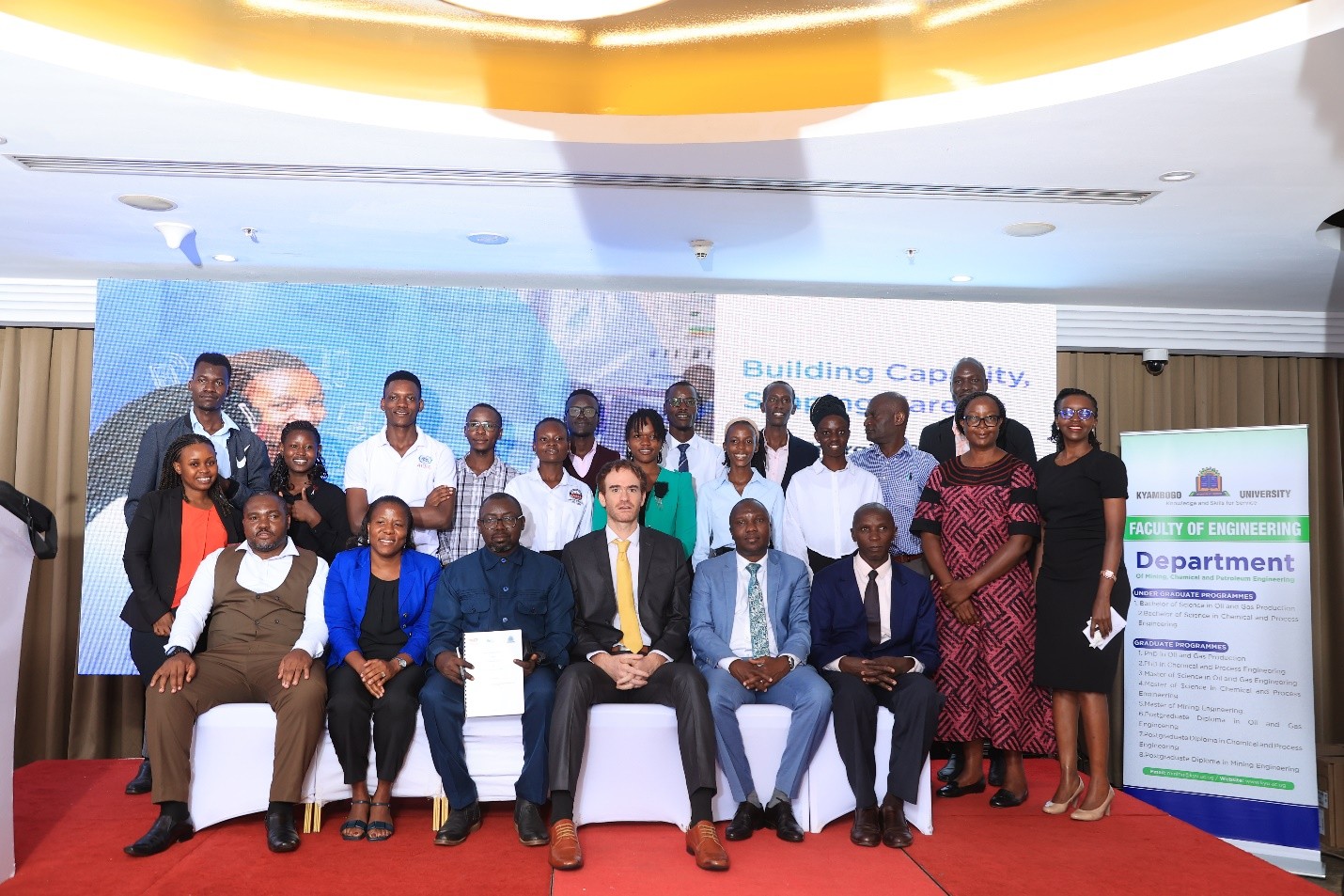 Mr. Valerian Pfrimmer-SLB, Mr. James Okwi-PAU and Ms. Adreen Kanyesigye- TotalEnergies EP pose for a photo with Kyambogo University team