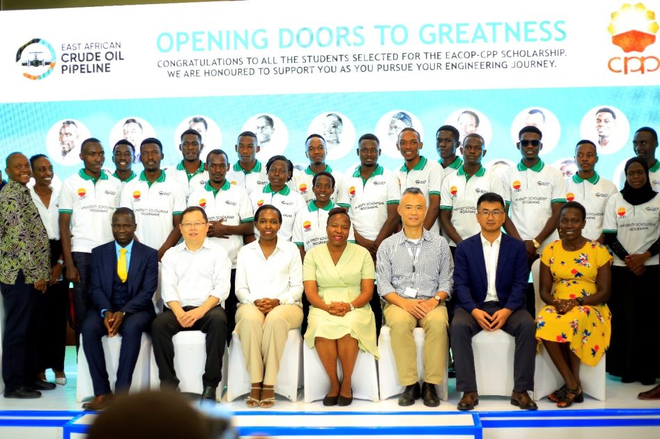 The Kyambogo University awardees, staff and sponsors pose for a photo after the launch of the EACOP-CPP Scholarship at Sheraton Hotel.