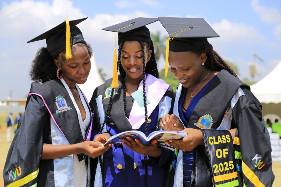 Graduands are excited to find their names in the graduation booklet