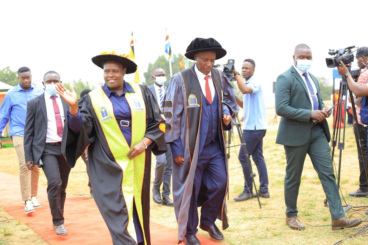 The Vice President H.E. Jessica Alupo, with the Vice Chancellor Prof. Eli Katunguka while walking during the procession of Graduation Day one