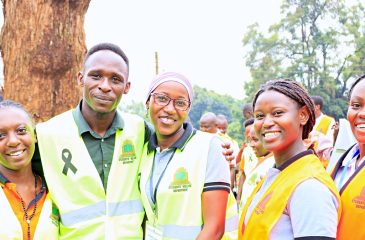 Students pose for a photo after marching