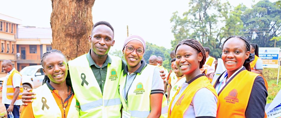 Students pose for a photo after marching