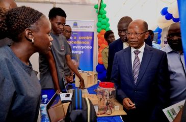 The Minister of State for Higher Education, Dr. John Chrysostom Muyingo while visiting the Kyambogo University stall