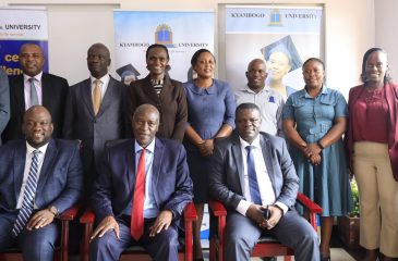 The Vice Chancellor Kyambogo University, Prof. Eli Katunguka (middle), with the Vice Chancellor Accra Technical University, Engr. Prof. Amevi Acakpovi (left) pose for a group photo with other members of the 2 universities after signing MoU