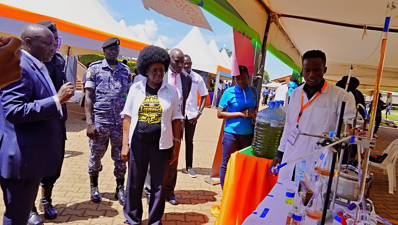 Hon. Dr. Monica Musenero Masanza, Minister for Science, Technology and Innovation, tours exhibition stalls at the Kyambogo University STEAM Festival, engaging with innovators and showcasing practical science-driven solutions.