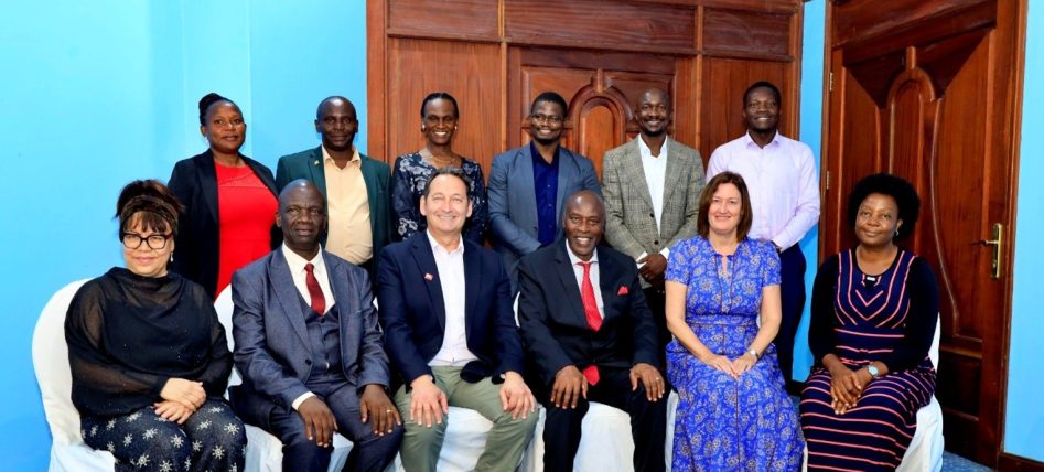 Kyambogo University team and UWE team pose for a photo after a partnership dinner