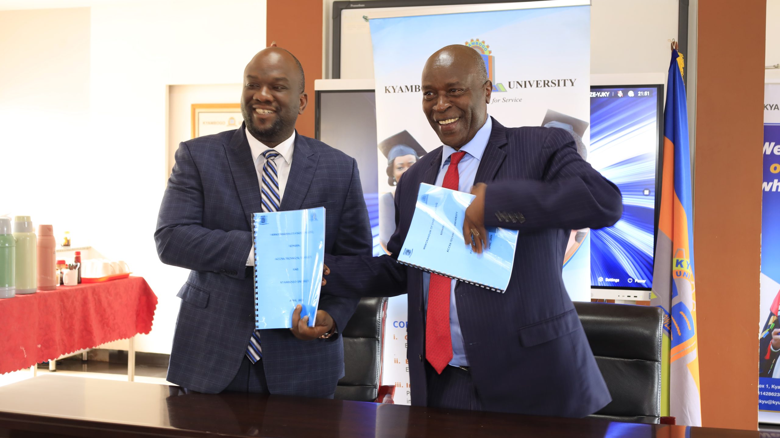 The Vice Chancellor of Kyambogo University, Prof. Eli Katunguka, with the Vice Chancellor of Accra Technical University, Engr. Prof. Amevi Acakpovi, after sealing their partnership