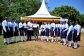 The Vice Chancellor Prof. Eli Katunguka handing over a certificate of recognition to one of the secondary schools present at the Girls in STEM event.