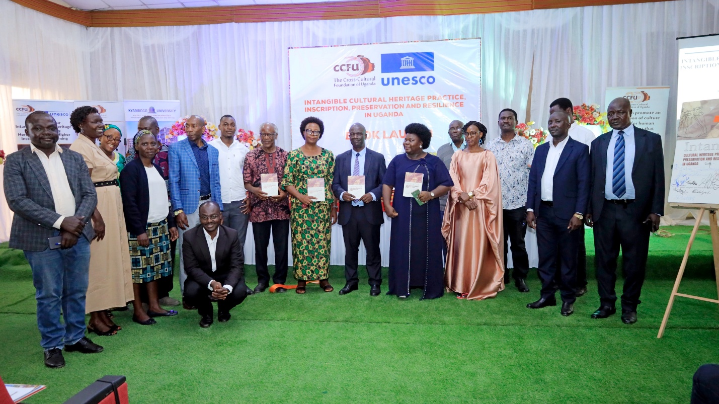 Publishers pose for a photo after the launch