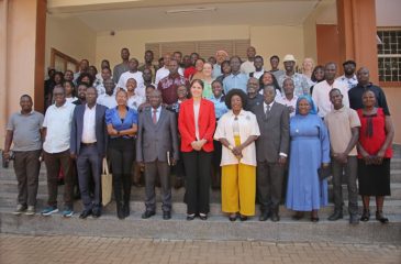 Participants pose for a group photo after the discussion