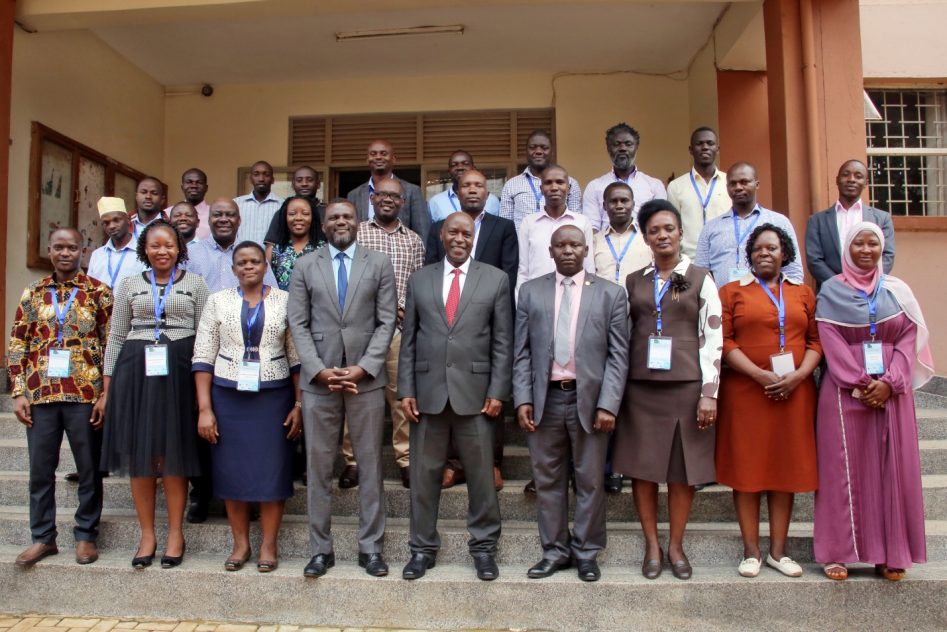 Participants pose for a group photo after the malaria workshop