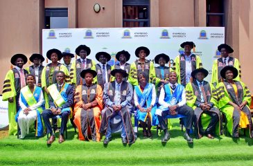 The Vice Chancellor Prof. Katunguka, Academic Registrar Dr. Anne Begumisa with Deans, and chief freshers pose for a group photo after the event